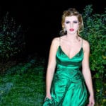 portrait photo of a prom queen in a green dress