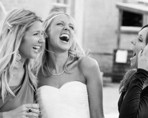 bride laughing with friends